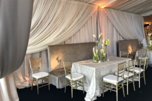 Custom champagne satin perimeter ivory sheer layering drapes event rental Wedding Alabama tent reception