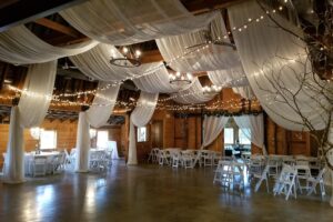 Quest Events Event Drapery Special Events Social Gatherings Wedding Reception Barn Scenic Design Decor Chandelier Specialty Drape Ceiling Treatment LED Twinkle String Lights Oaks Farm