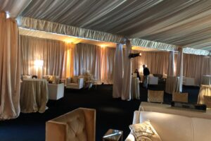 wedding drapery tent custom champagne satin ceiling treatment satin perimeter ivory sheer layering event drapery rentals