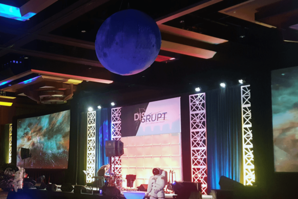 Disrupt event stage backdrop rental scenic geo panel kaos pattern