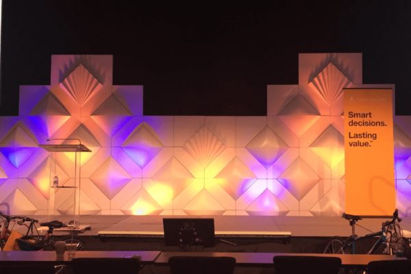 FormSet Stage Conference Backdrop Design Patterns Quest Event Rentals Meeting Fans In Form Uplighting