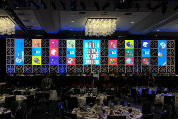 Quest Events Corporate Special Event Big 10 Luncheon Hotel Convention Center Staging Scenic Design Drape GeoPanels Lectern Chandelier