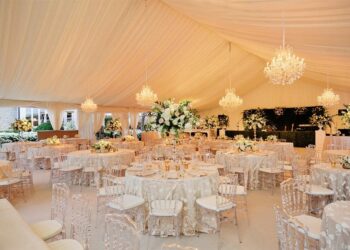 Quest Events Visual Elements Nashville Tennessee Special Events Outdoor Tent Wedding Reception Boxwood Chandeliers Specialty Drape Scenic Stage Decor