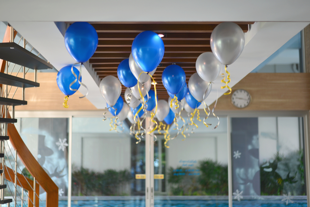 Blue & silver balloons on the ceiling