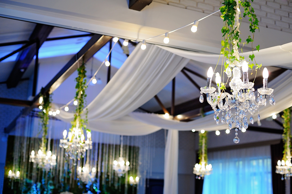 Ceiling Decor with tulle and eclectic chandeliers