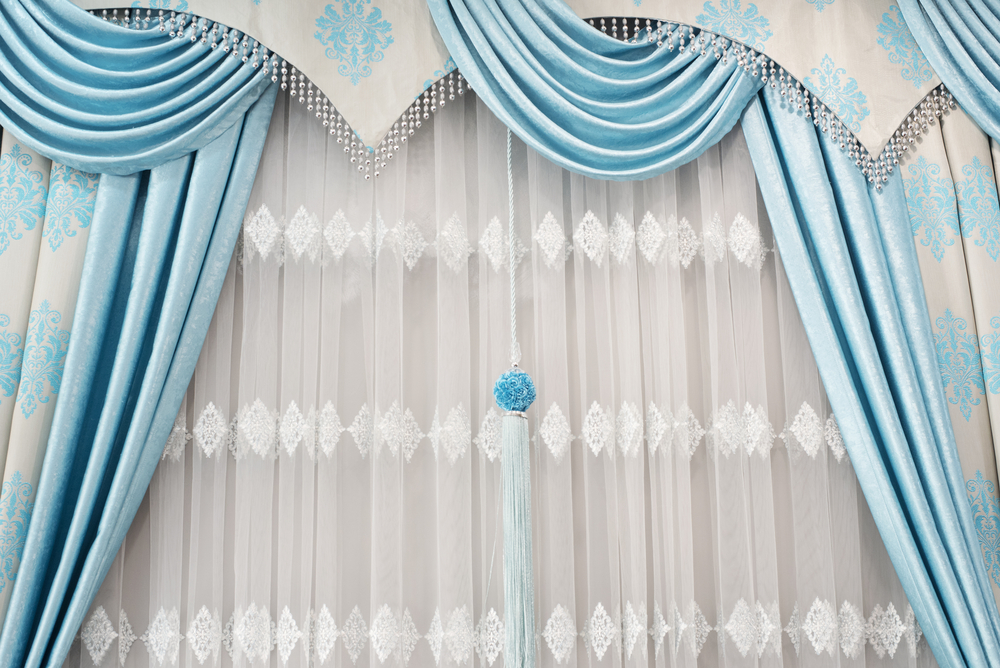 Close-up of curtain drapery with pendants