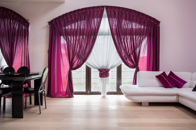 Window with purple drapes