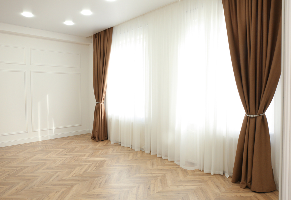 Windows with elegant curtains and drapes