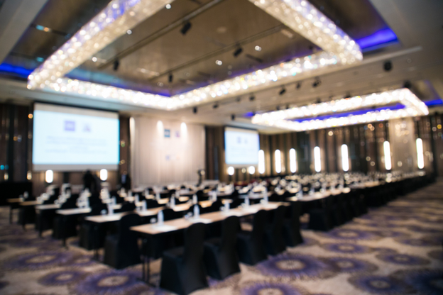 Blur photo of Big Meeting room with chair table and light