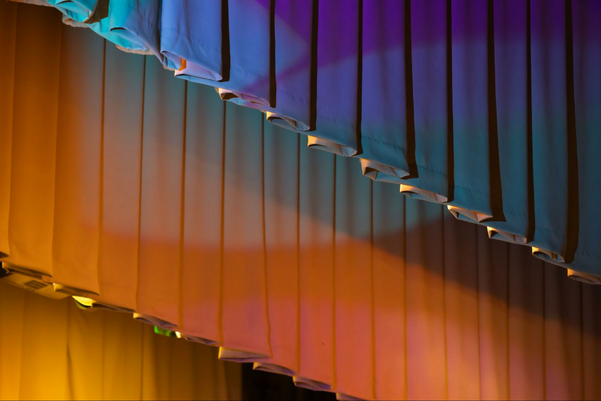 Drapes with colorful stage illumination